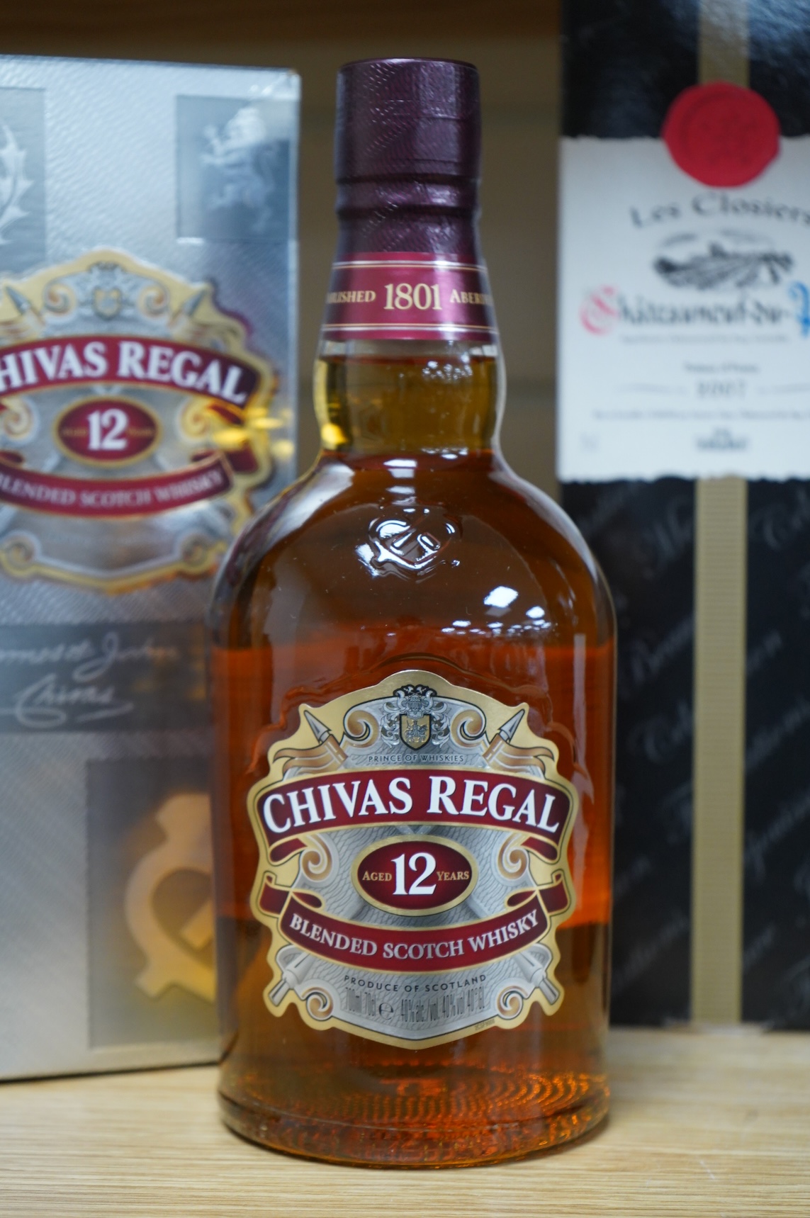 Three bottles of wine and spirits to include Chateauneuf De Pape, 2007 and Chivas Regal scotch whisky